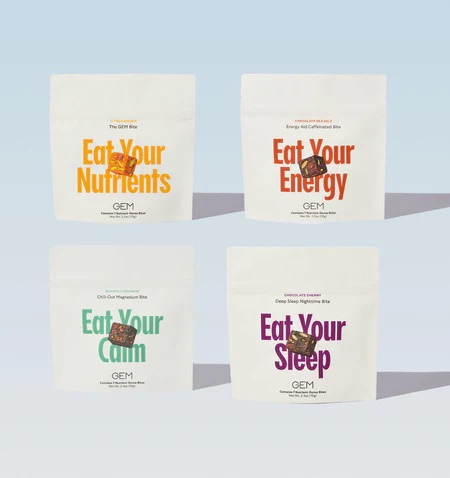 Four white pouches labeled "Eat Your Nutrients," "Eat Your Energy," "Eat Your Calm," and "Eat Your Sleep" displayed against a light blue background.