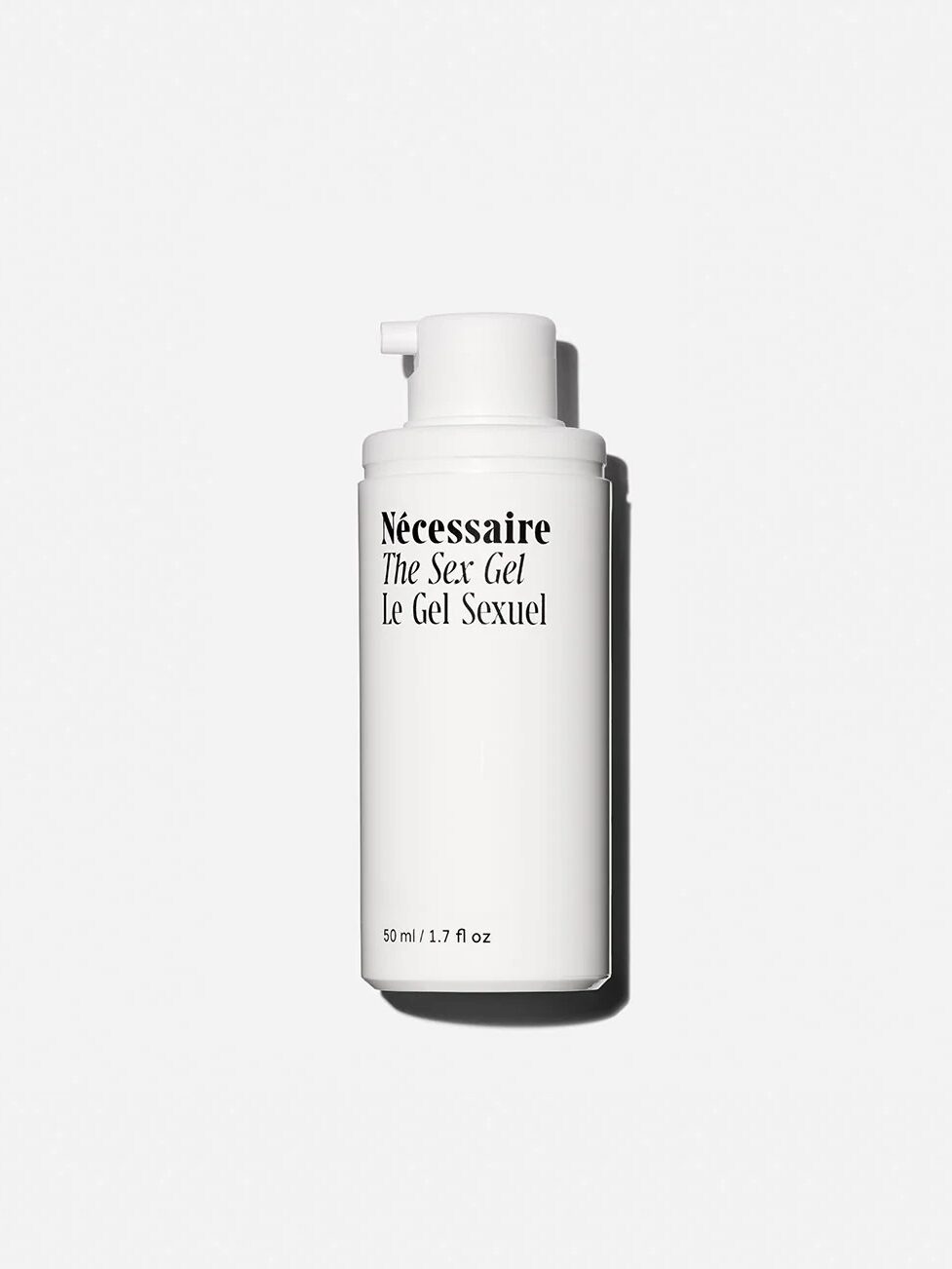 A white bottle labeled "Nécessaire The Sex Gel Le Gel Sexuel" with a pump dispenser, 50 ml / 1.7 fl oz size.