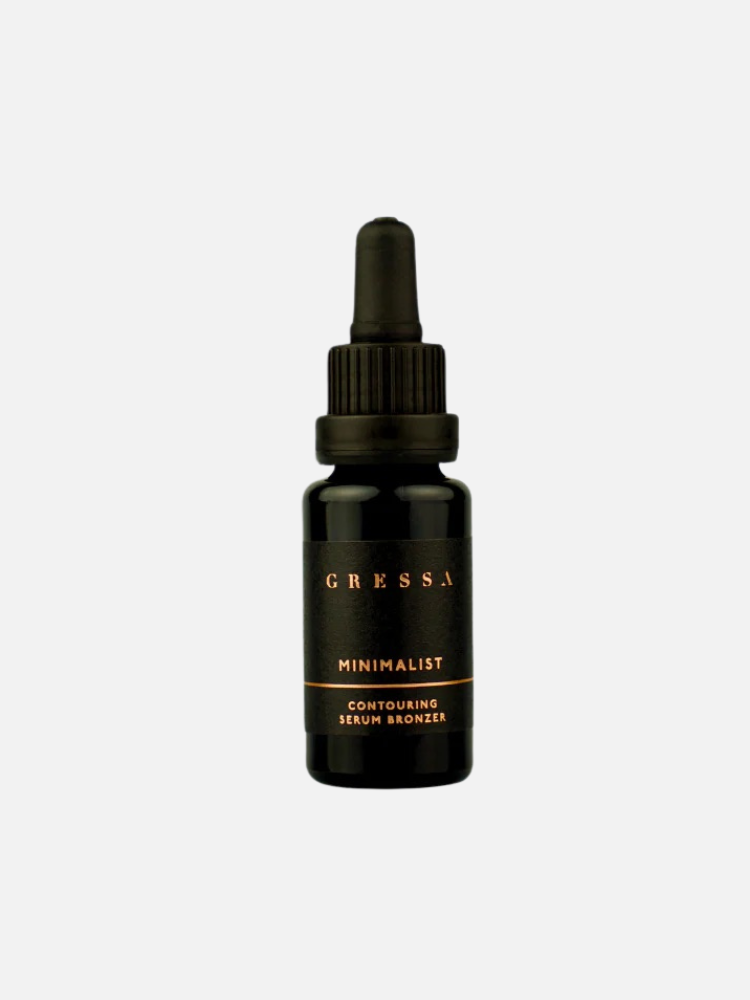 A black dropper bottle labeled “Gressa Minimalist Contouring Serum Bronzer” against a plain white background.
